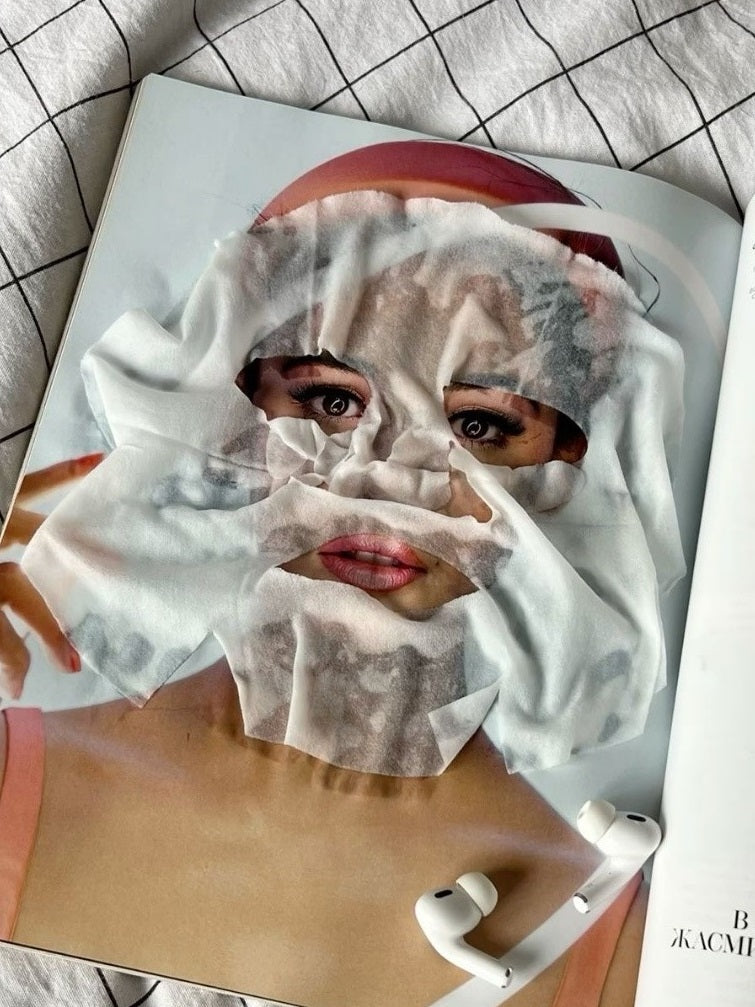 Image of sheet mask on woman's face